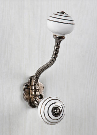 Silver Stripes on a White Ceramic Knob With Metal Wall Hanger