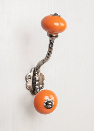 Solid Orange Colored Knob With Metal Wall Hanger