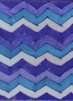 Blue,lime blue,turqouise and white zig-zag tile