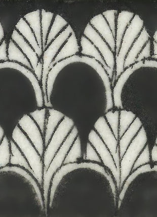 White Pattern On Black Base Tile