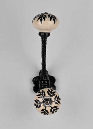 White Ceramic Knob Black Petal Stem Design With Metal Wall Hanger
