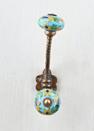 Yellow Flower And Green Leaf Design On Turquoise Knob With Metal Wall Hanger