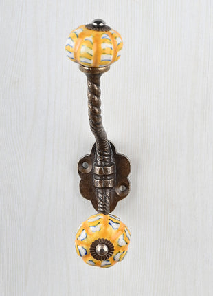 Yellow And White Ceramic Melon Shaped Knob With Metal Wall Hanger