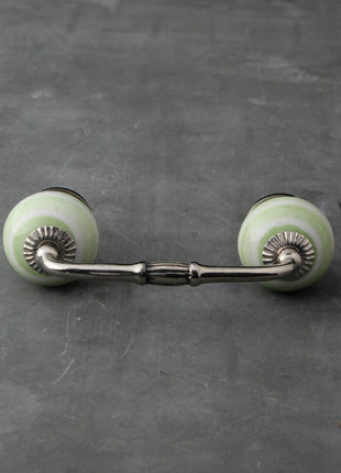 White Ceramic Kitchen Cabinet Pull With Lime Green Spiral Print