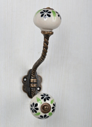 Black Flower On White Ceramic Cabinet Knob With Metal Wall Hanger