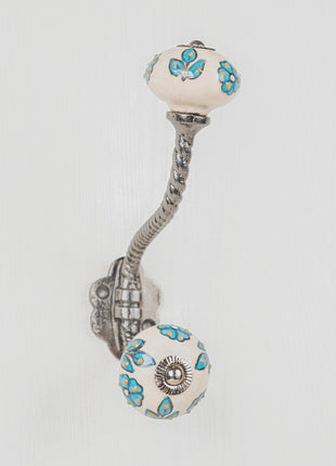 Teal Color Flowers And Petals On White Ceramic Knob With Metal Wall Hanger
