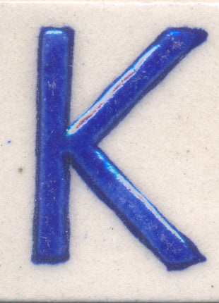 Blue K alphabet white tile (2x2)