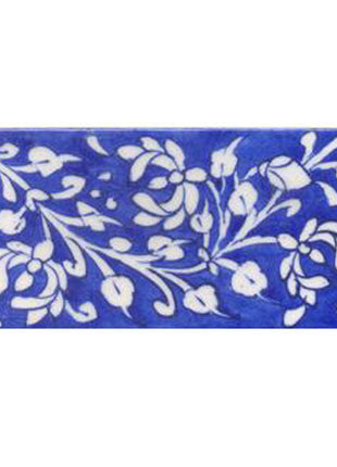 White leaves and flower with blue tile
