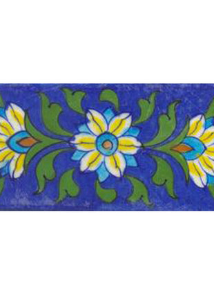 Three yellow and turqouise flower and green leaves with blue tile