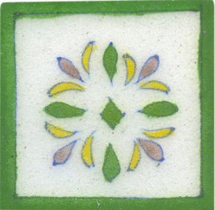 White tile with green border and green pink flower