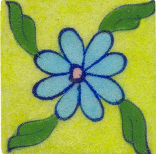 Light blue flower on light green tile