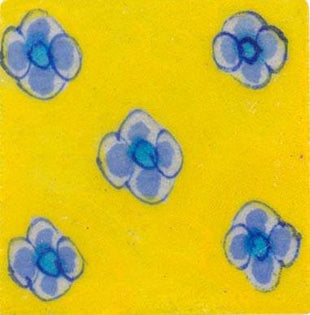 Blue flowers on yellow tile
