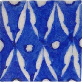 White pattern on blue tile