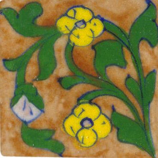 brown tile with green leaves and yellow flower