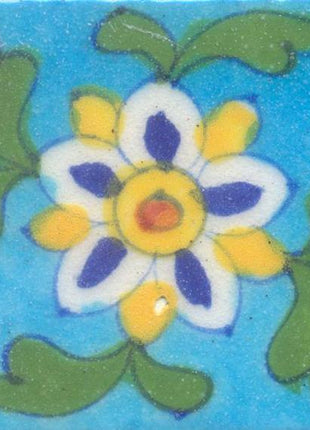 Blue,White and Yellow Flowers With Green Leaves On Turquoise Base Tile