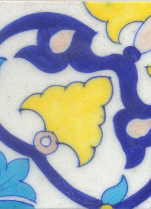 Blue, yellow & turquoise flowers on white tile