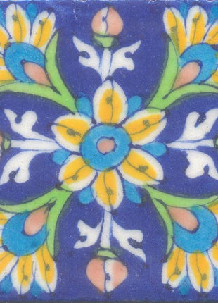 Yellow, turquoise, brown and green flowers on blue tile (3x3-bpt10)
