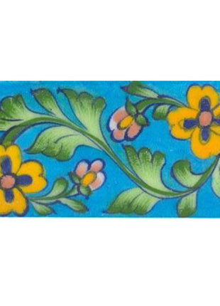 yellow flowers and green leaves with pink flowers on turquoise tile