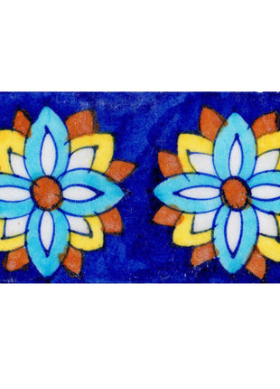 Two Flower Design On Blue Tile