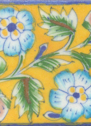 Turquoise,yellow and Blue Flowers and Lime Green leaf with Yellow Base Tile