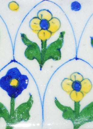 Blue and yellow flowers with green leaves on white base (3x3)
