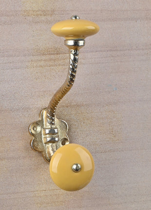 Round Solid Yellow Knob With Metal Wall Hanger