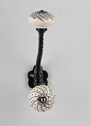 White Ceramic Knob With Black Design With Metal Wall Hanger