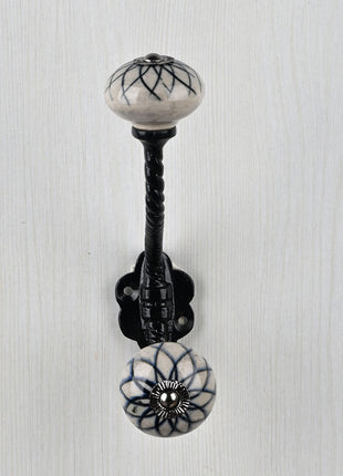 Handmade Black Flower Design on Light Gray Base Ceramic Knob With Metal Wall Hanger