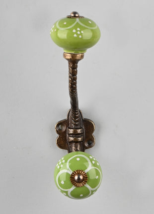 White Flower Design on Green Base Knob With Metal Wall Hanger