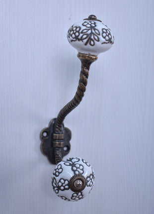 Black Design On White Ceramic Cabinet Knob With Metal Wall Hanger