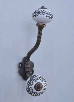 Black Flower On White Ceramic Cabinet Knob With Metal Wall Hanger