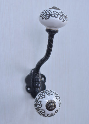 Black Flower On White Ceramic Cabinet Knob With Metal Wall Hanger