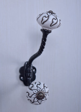 Black Flower and Leaf On White Base Ceramic Knob - Metal Wall Hanger