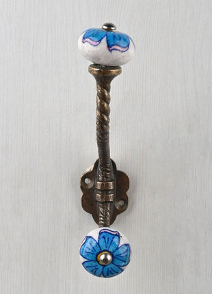 Turquoise Flower On White Knob With Metal Wall Hanger