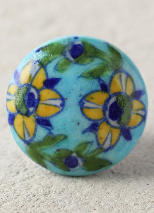 Turquoise Knob with Yellow and Blue Flowers and Green Leaves