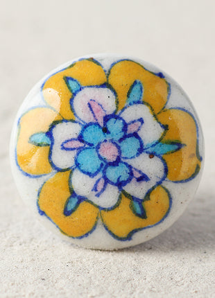 Yellow, White, Turquoise and Pink Flower on White and Blue Knob