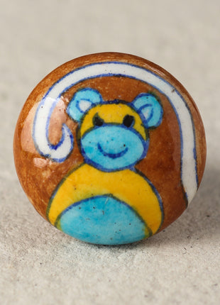 Brown Ceramic Knob With Handmade Turquoise Monkey Design