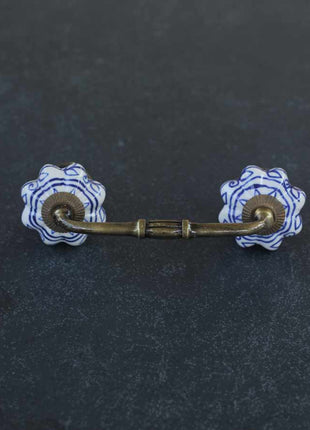 White Ceramic Cabinet Pull With Blue Floral Design