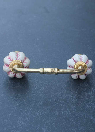 Flower Shaped White Ceramic Pull With Maroon Design