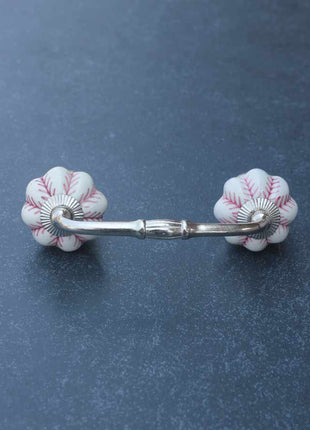 Flower Shaped White Ceramic Pull With Maroon Design