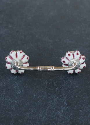 White Cabinet Pull With Maroon Floral Design