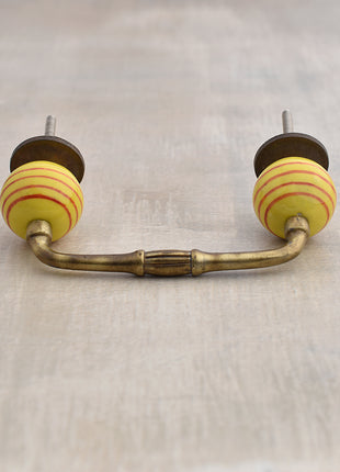 Yellow Round Ceramic Wardrobe Pull With Spiral Red Design