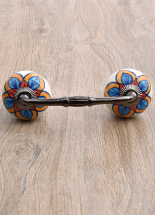 Stylish White Drawer Cabinet Pull With Red, Turquoise and Yellow Colored Flower
