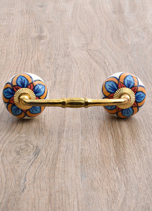 Stylish White Drawer Cabinet Pull With Red, Turquoise and Yellow Colored Flower
