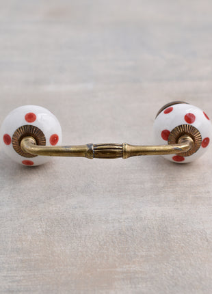 White Round Ceramic Drawer Pull With Red Polka Dots