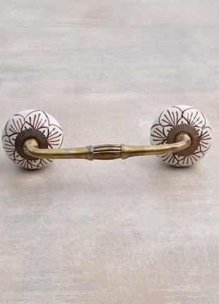 Well Designed White Ceramic Drawer Pull With Brown Print