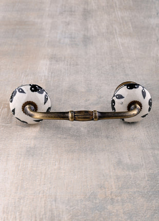 White Base Ceramic Door Pull With Black Floral Print