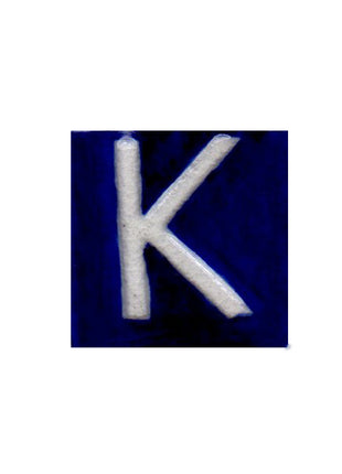 White K alphabet blue tile (2x2)