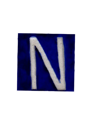 White N alphabet blue tile (2x2)